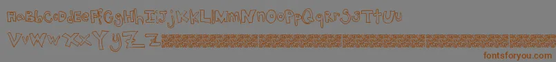 Jacktrades Font – Brown Fonts on Gray Background