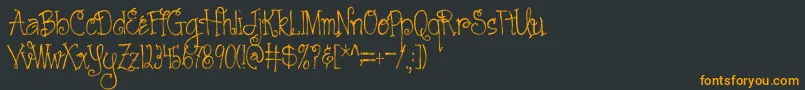 フォントAustieBostCartwheels – 黒い背景にオレンジの文字
