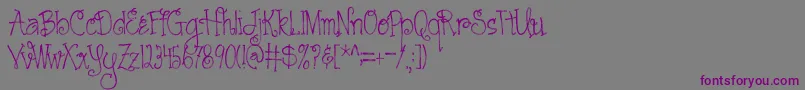 AustieBostCartwheels Font – Purple Fonts on Gray Background