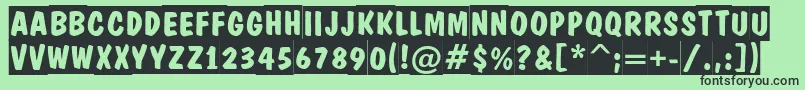 ADominotitulslBold Font – Black Fonts on Green Background