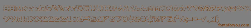 フォントYamamoto3D – 茶色の文字が灰色の背景にあります。