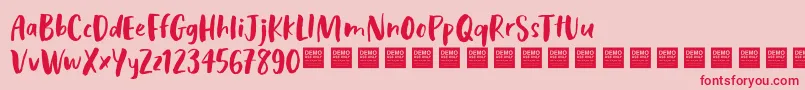 CosmicRaysDemo Font – Red Fonts on Pink Background