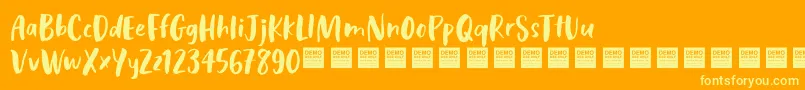 CosmicRaysDemo Font – Yellow Fonts on Orange Background