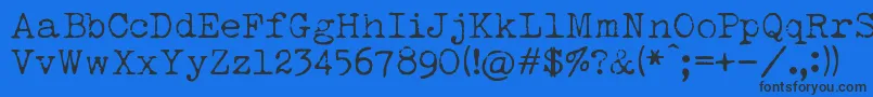 LuckyTypewriter-Schriftart – Schwarze Schriften auf blauem Hintergrund