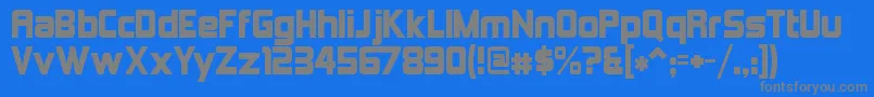 KimberleyAlternate-fontti – harmaat kirjasimet sinisellä taustalla