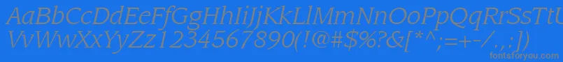Czcionka AdvisorSsiItalic – szare czcionki na niebieskim tle