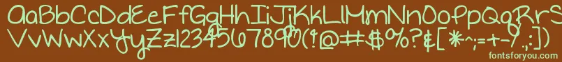 Writteninthestars Font – Green Fonts on Brown Background