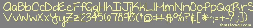 Writteninthestars Font – Yellow Fonts on Gray Background