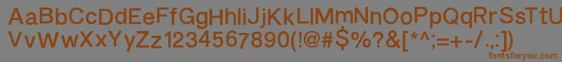 フォントBurveticaNc – 茶色の文字が灰色の背景にあります。