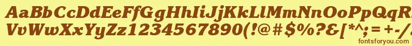 フォントKorinnablackcttBolditalic – 茶色の文字が黄色の背景にあります。