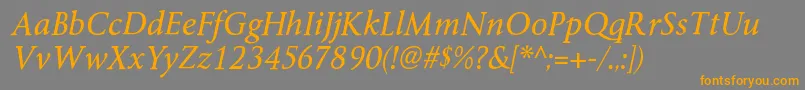 フォントByingtonrgItalic – オレンジの文字は灰色の背景にあります。