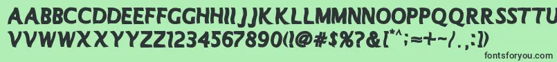 Manolete Font – Black Fonts on Green Background