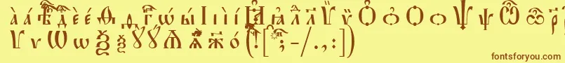 フォントHirmosUcsSpacedout – 茶色の文字が黄色の背景にあります。