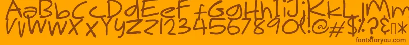 Czcionka MakNgahPunya – brązowe czcionki na pomarańczowym tle