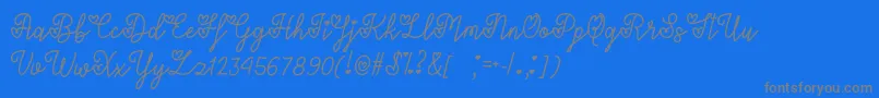 フォントLoversInFebruaryOtf – 青い背景に灰色の文字