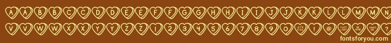 SweetHeartsOt Font – Yellow Fonts on Brown Background
