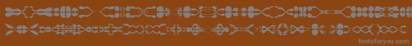 Lamorte11-Schriftart – Graue Schriften auf braunem Hintergrund