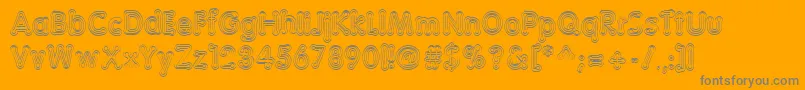 Teazer-Schriftart – Graue Schriften auf orangefarbenem Hintergrund