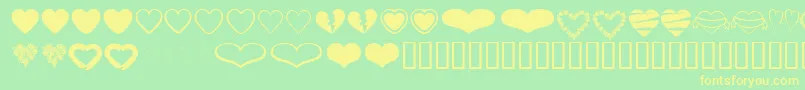 HeartsBv Font – Yellow Fonts on Green Background