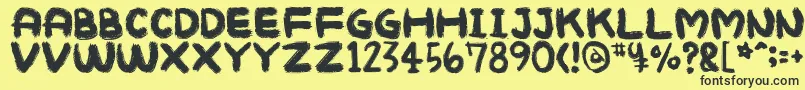 Mukokuseki Font – Black Fonts on Yellow Background