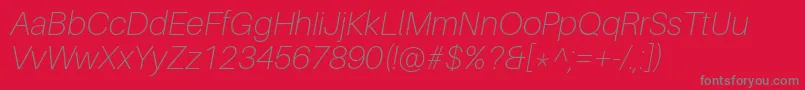 フォントAileronThinitalic – 赤い背景に灰色の文字