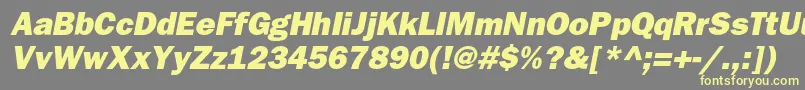 BloknotheavycItalic-Schriftart – Gelbe Schriften auf grauem Hintergrund