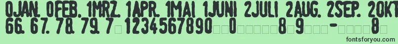 フォントLinotypeTagesstempelFett – 緑の背景に黒い文字