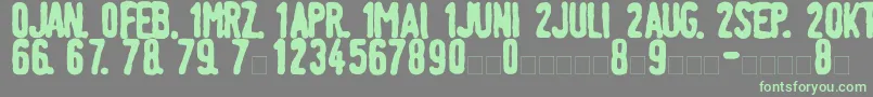 LinotypeTagesstempelFett Font – Green Fonts on Gray Background