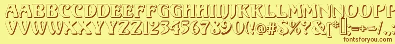 フォントVoluteShadow – 茶色の文字が黄色の背景にあります。