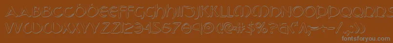 TristramShadow-fontti – harmaat kirjasimet ruskealla taustalla