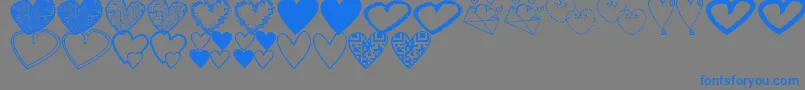 Fonte HeartsShapessTfb – fontes azuis em um fundo cinza