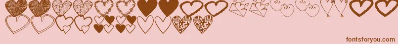 Шрифт HeartsShapessTfb – коричневые шрифты на розовом фоне