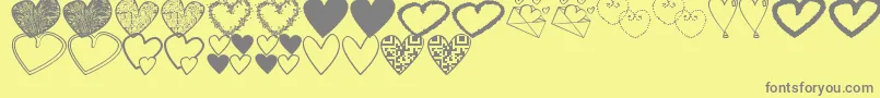 HeartsShapessTfb Font – Gray Fonts on Yellow Background