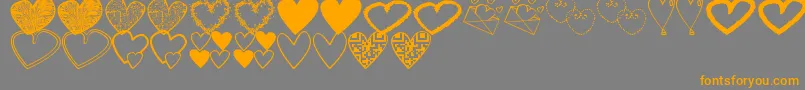 HeartsShapessTfb Font – Orange Fonts on Gray Background