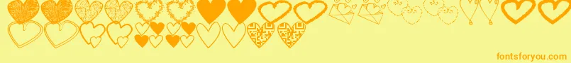 Czcionka HeartsShapessTfb – pomarańczowe czcionki na żółtym tle