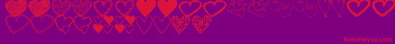 Czcionka HeartsShapessTfb – czerwone czcionki na fioletowym tle