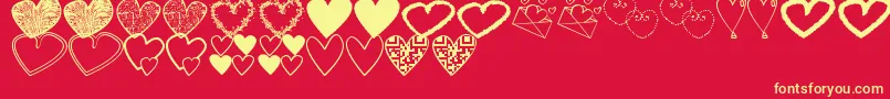 fuente HeartsShapessTfb – Fuentes Amarillas Sobre Fondo Rojo