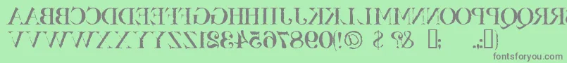 フォントBassackwards – 緑の背景に灰色の文字