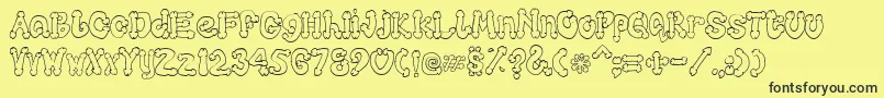 Cocksure Font – Black Fonts on Yellow Background