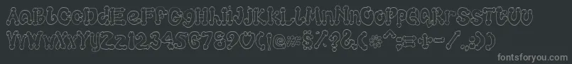 Cocksure Font – Gray Fonts on Black Background