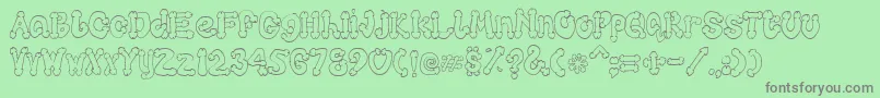 Cocksure Font – Gray Fonts on Green Background