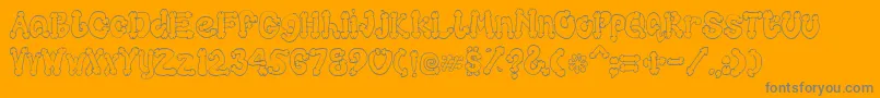 Cocksure Font – Gray Fonts on Orange Background