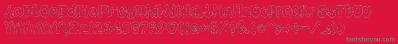 Cocksure Font – Gray Fonts on Red Background