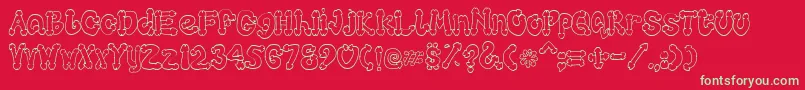 Cocksure Font – Green Fonts on Red Background