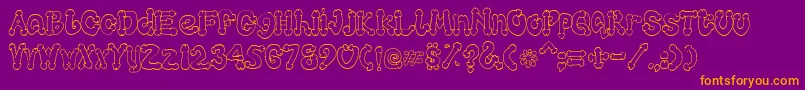 Cocksure Font – Orange Fonts on Purple Background