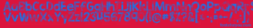 Czcionka Kgtribecastamp – niebieskie czcionki na czerwonym tle