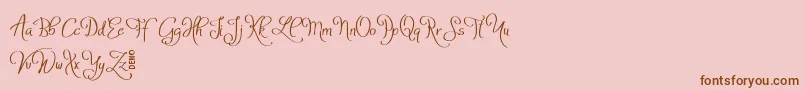 AtylaDemo-Schriftart – Braune Schriften auf rosa Hintergrund