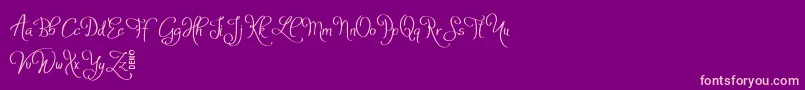 AtylaDemo-Schriftart – Rosa Schriften auf violettem Hintergrund