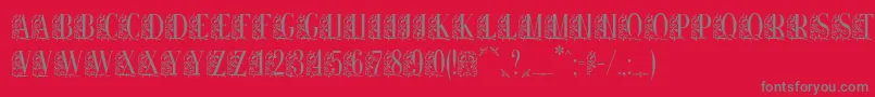 Remeslo-fontti – harmaat kirjasimet punaisella taustalla