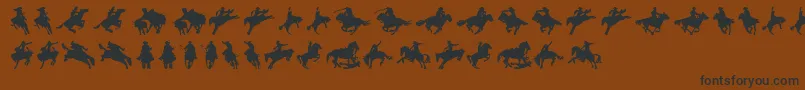 Cowboy Font – Black Fonts on Brown Background